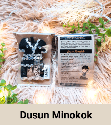 Mini magnet featuring the traditional attire of the Dusun Minokok people